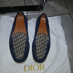 This is a pair of Dior Granville loafers in navy blue suede with a beige and black Dior Oblique jacquard insert on the vamp.  Size 8.5
