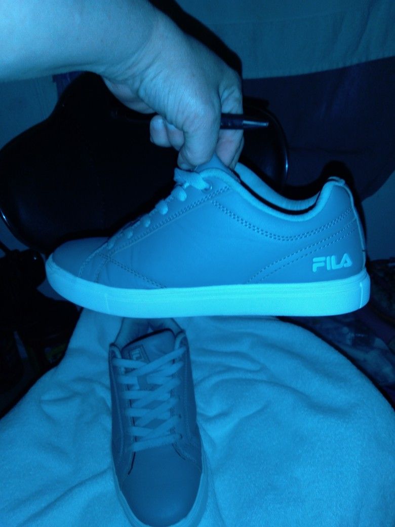 Gray An Blue Lase 7 1/2 Worn In Good Condition Still HD Them For Only a Couple Of Months. Women's FILAS.