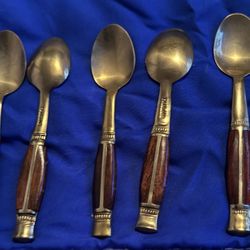Brass and wooden spoons from Asia
