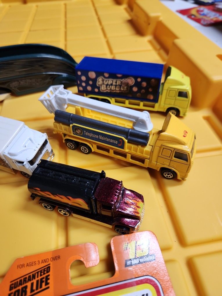 Lot Of 46 HOTWHEELS ( A Couple Are Matchbox) LONG HAULERS / RACING HAULERS/Rigs ( Priced At A Big Discount)!