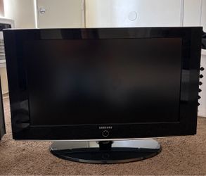 Samsung or LG Flat Screen TV with Stand