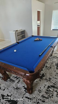 Blue and Brown Pool Table
