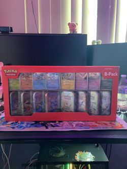 Pokémon Prismatic 8-Pack Tins