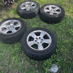 4 stock rims and tires Chevy Silverado 22s