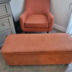 orange chair and ottoman