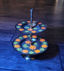 Vintage 2 tier brass enamel stand tray - glows under ultraviolet light