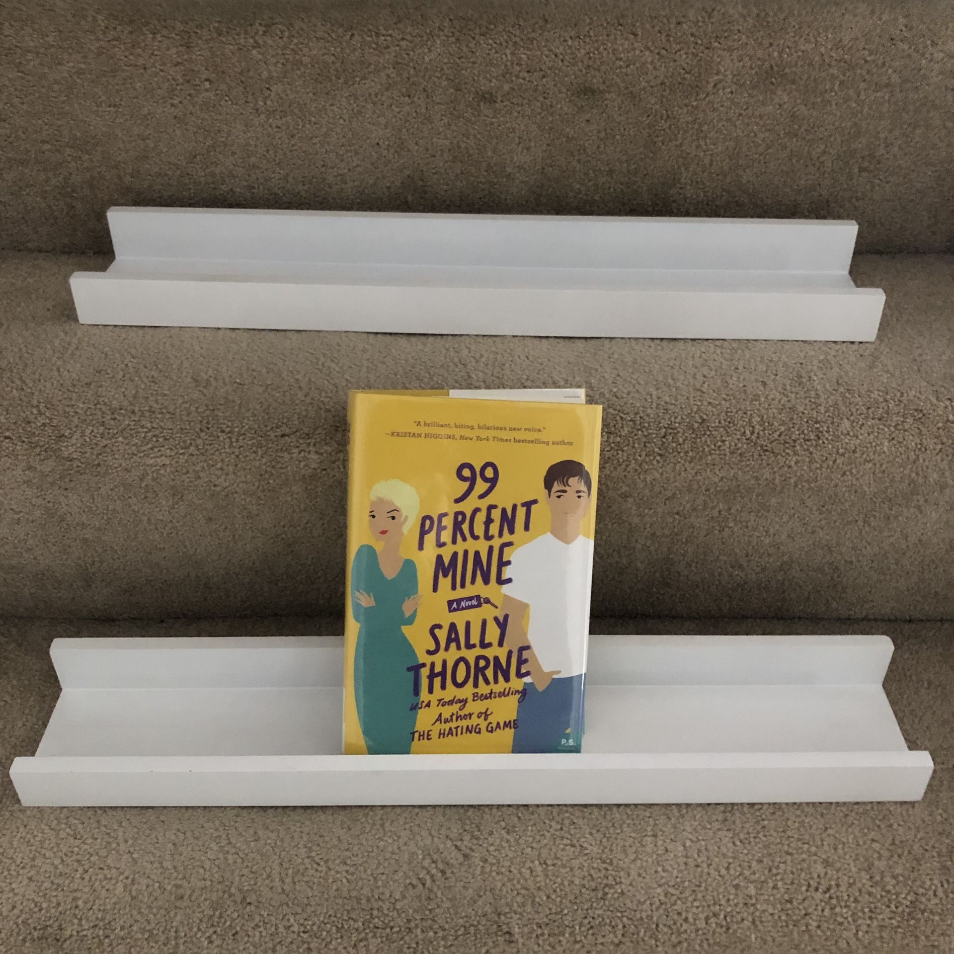 Set of two white book shelves