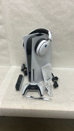 Sony PlayStation five with gaming headset, controller, accessories, and charging dock