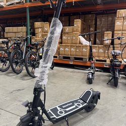 Electric scooter with shock absorption