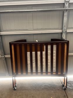 Beautiful Compact/ Collapsible Wooden Crib