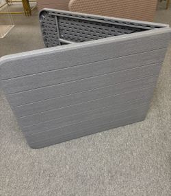 Plastic folding table