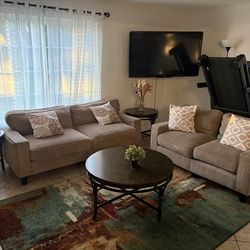 Couches,  3 tables,  accent rug lamp