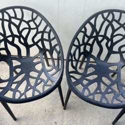 Two Black Modern Resin Outdoor Chairs