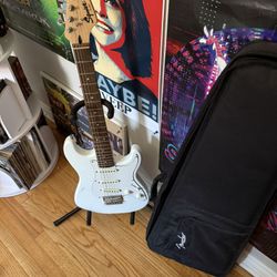 Fender White Electric Guitar(guitar, Stand, And Case)