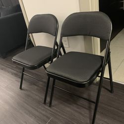 Padded folding chairs (2)