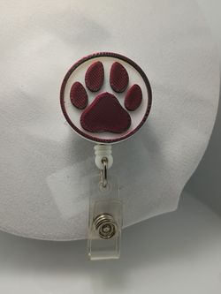 3d printed paw print badge reel.