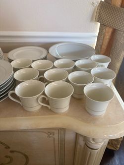 Plate set with with 12 piece cup set