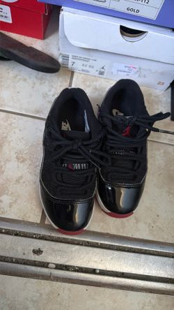 JORDAN 11 RETRO LOW BRED