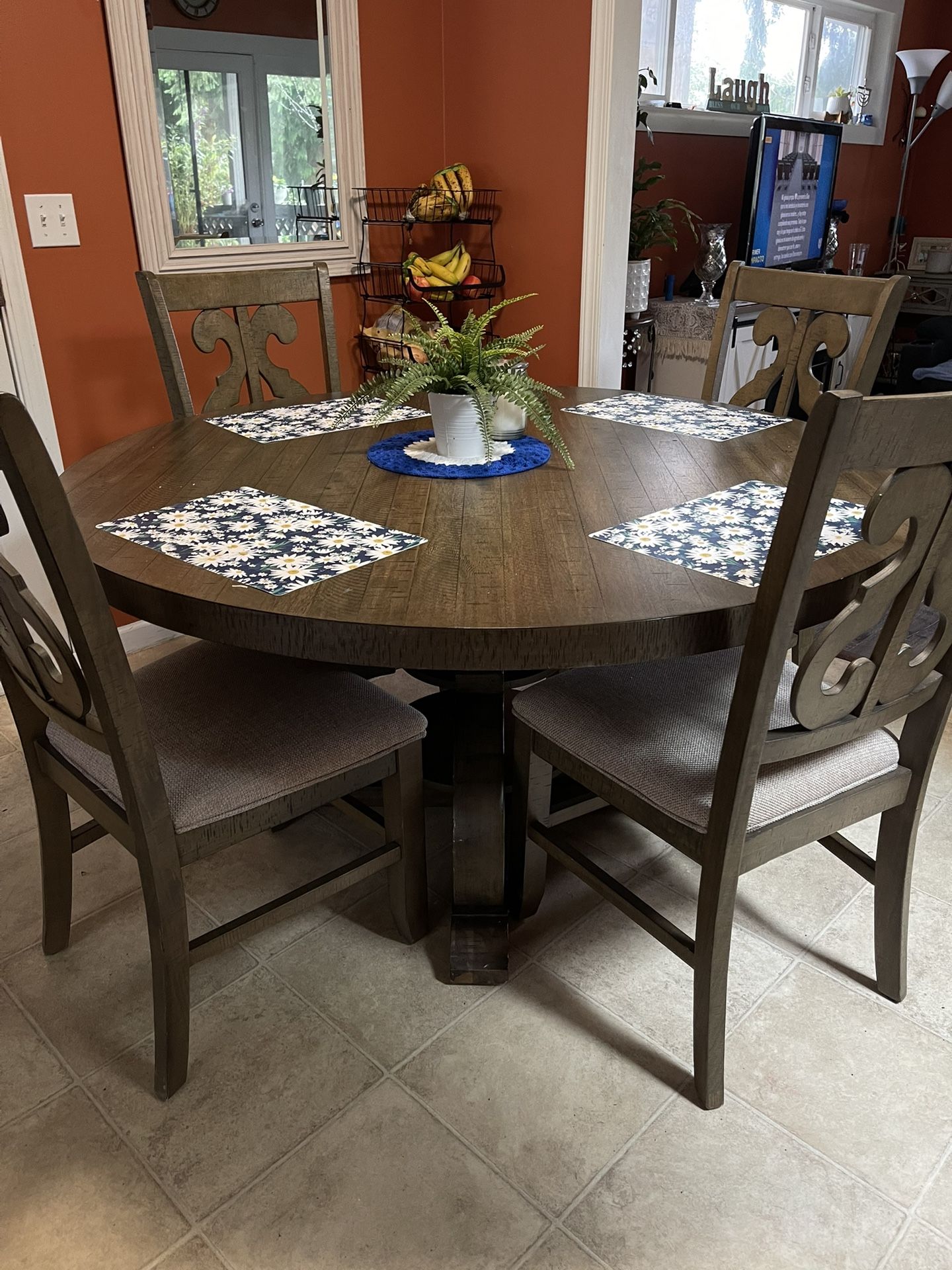 Dining table set with 4 chairs from Ashley Furniture.