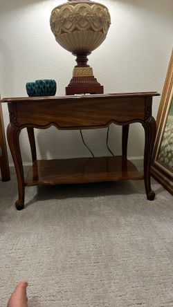 Two identical end tables