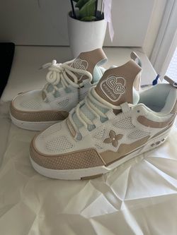 (7) Lv skate shoes beige ($150)