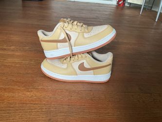 Size 3 Nike Airforces 1 LV8 Ale brown.