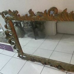 Hollywood Recency gold gilt Beveled Mirror carved intricate details carved. 40 x 30"