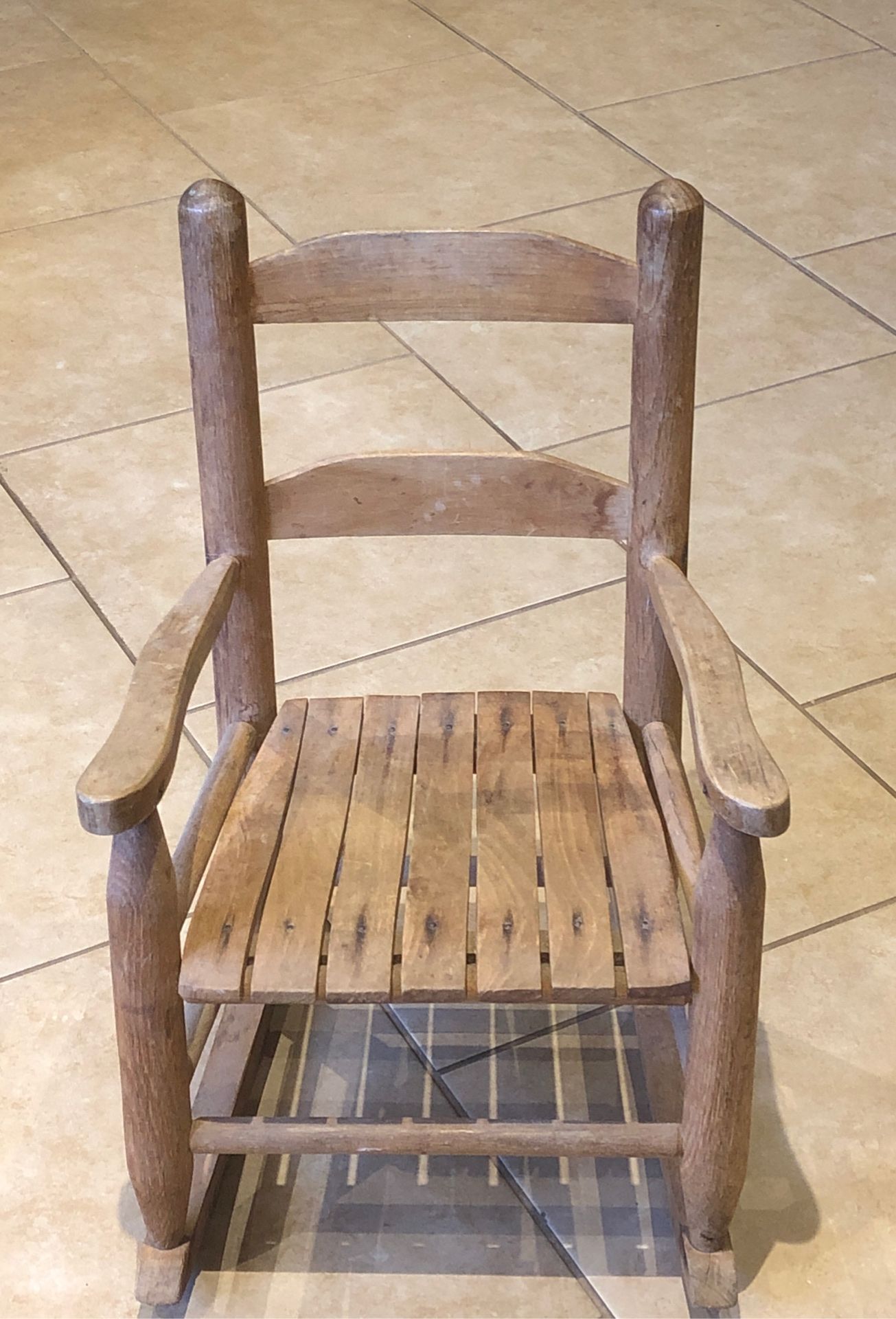 Antique small child’s sturdy solid wood rocking chair