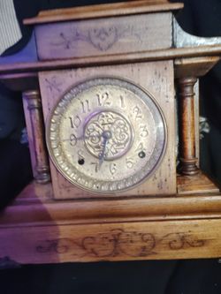 antique wooden mantel clock