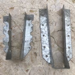 Eight 2x7 and two pieces of 2x9" joist brackets. $10 all