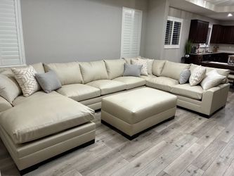 Custom leather sectional new sold as is!! Customer return