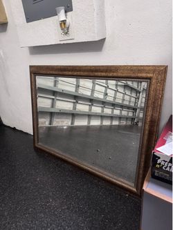 Mirror with gold frame