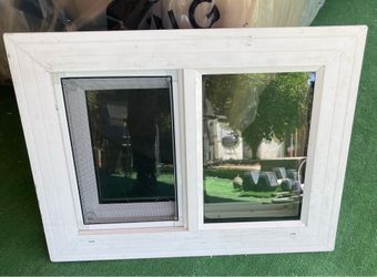 (1) Double glass window, retrofit, 22in (w) x 16in (tall)