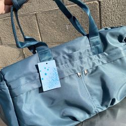 Green duffle bag