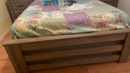 The bed is a full size and it comes with the bed frame