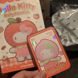 Peach Hello Kitty Plush Pendant