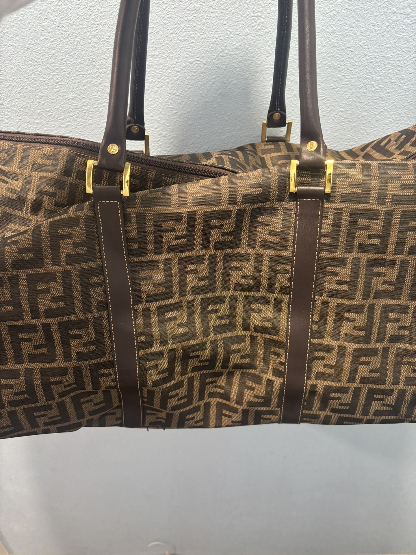 Louis Vuitton And Fendi Luggage Bags