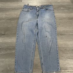 Vintage Levi's 560 men's light blue Wash distressed denim jeans