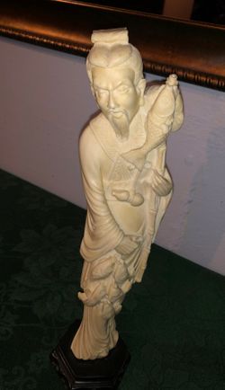 Antique Chinese fisher man