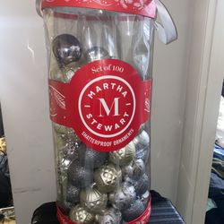 Container of 100 Silver shatterproof ornaments by Martha Stewart. Might be missing a few but definitely has dozens.  Pick up available in Arlington VA