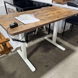NEW - Electric 47.5 x 24” in Standing Desk, Memory Height Adjustment, One-Piece Rustic Vintage Brown Top, White Frame