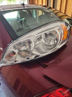 Driver side Chevy Impala headlamp assembly