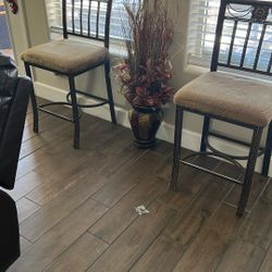 Two High Rod Iron Chairs