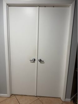 Wood door 2 panels good condition one panel size L 80 inches W24 inches