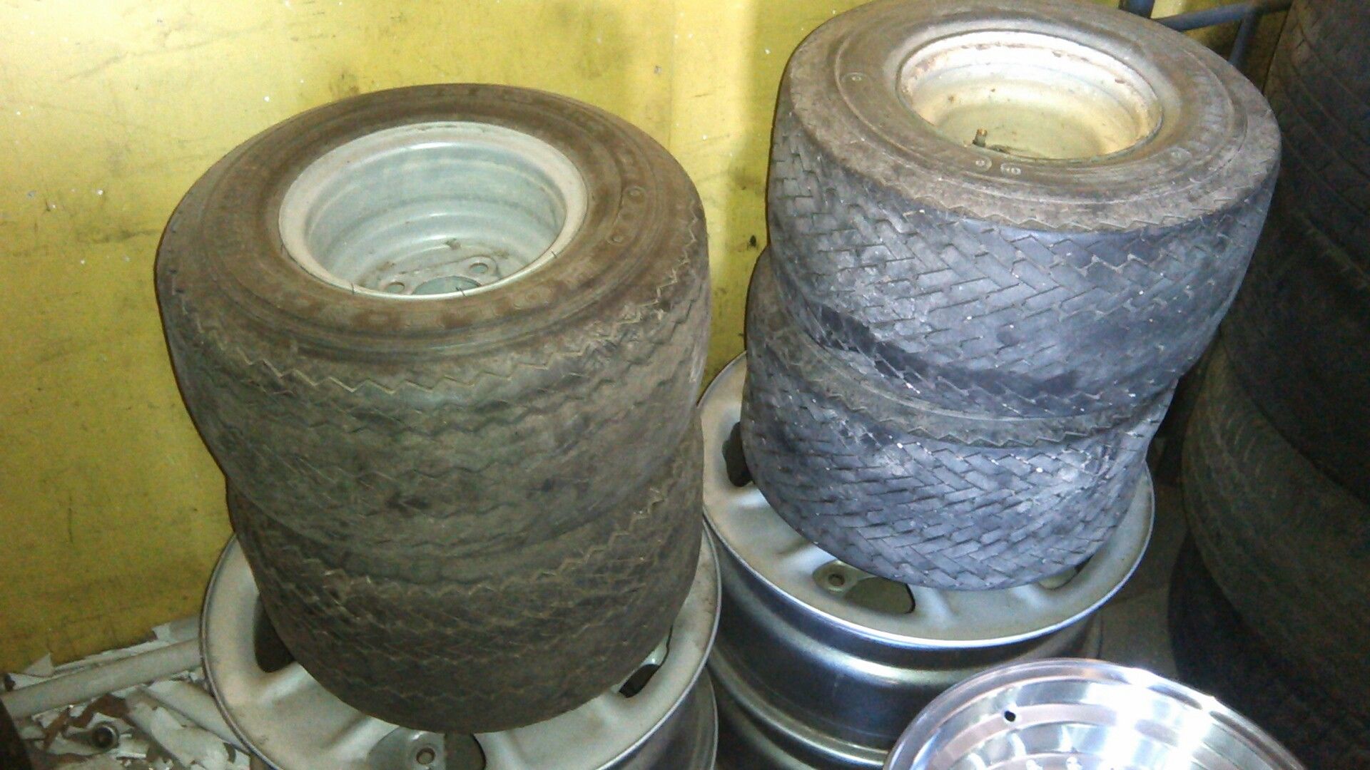 Set of golf cart rims and tires