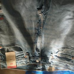2 Pairs Of Brand New Levis 34x32, XL Ultra Performance Shorts also new.