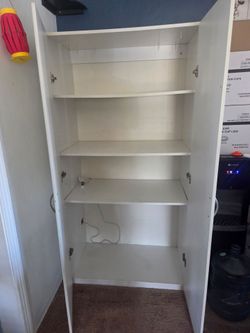 FREE Tall White Storage Cabinet with Shelves