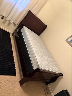 Twin bed with mattress and box spring