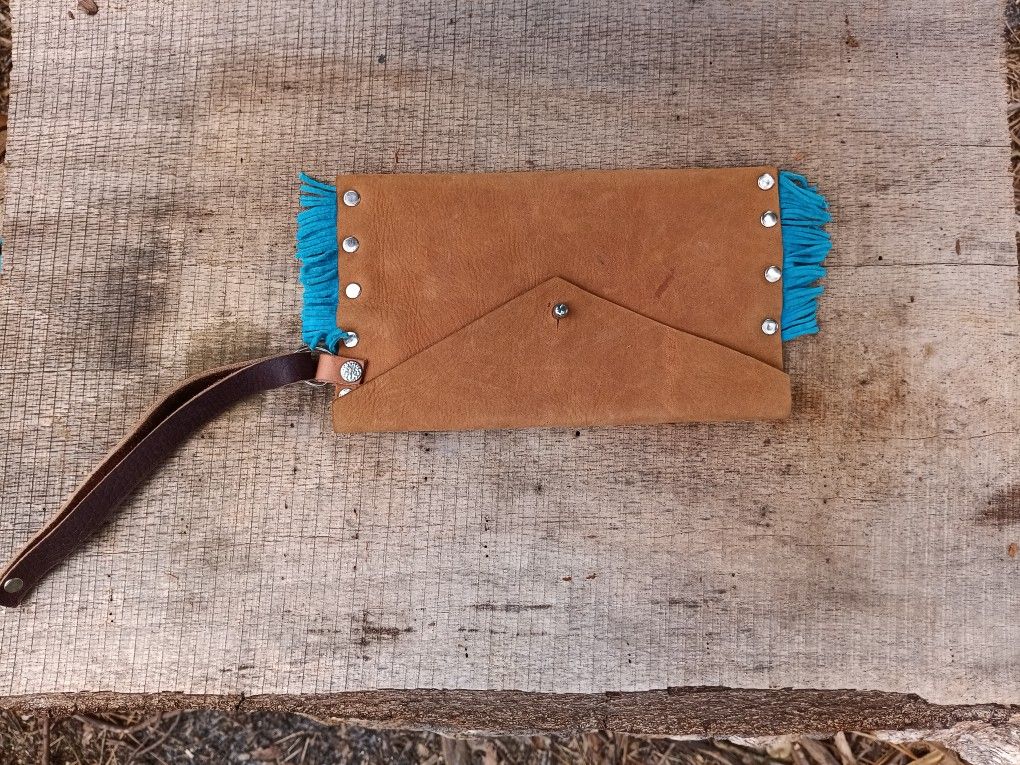 HANDMADE LEATHER CLUTCH WITH BLUE SUEDE FRING