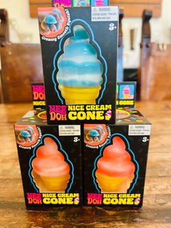 6 orange, 1 blue 100% Authentic NeeDoh Nice Cream. Bought online not at retail price.